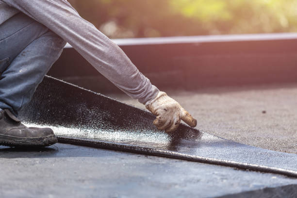 Professional Basement Waterproofing technician working in Seminole, AL
